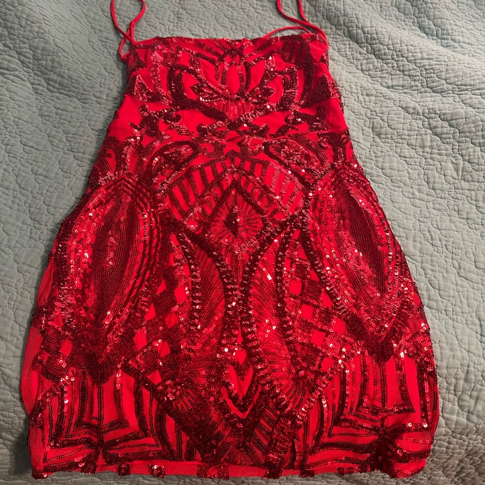 Brand new date party dress. Sparkly spaghetti strap/backless dress.